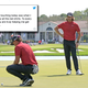 Tommy Fleetwood (r.) and Cameron Champ wear red on Sunday for Tiger Woods.